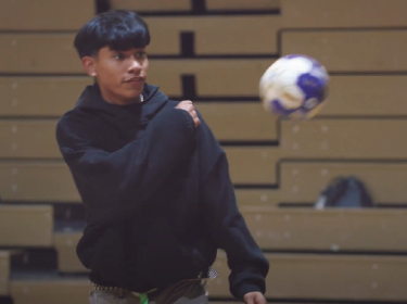 student throwing ball